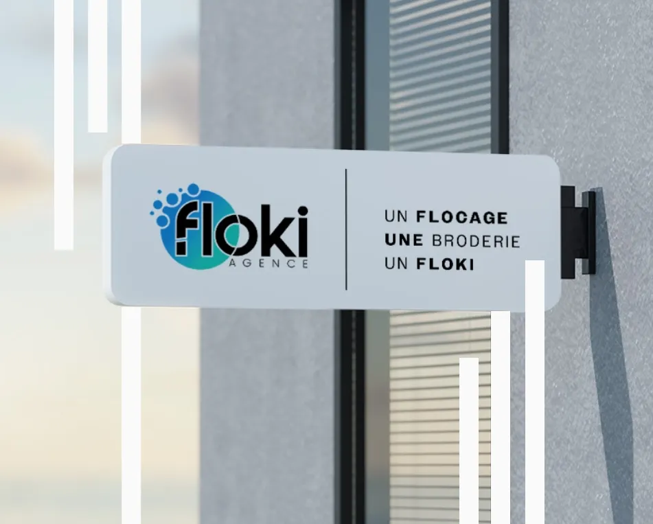Panneaux de l'agence de publicité et de flocage Floki, représentant son logo bleu et vert avec une écriture noire.